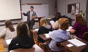 UNA President Ken Kitts teaching class